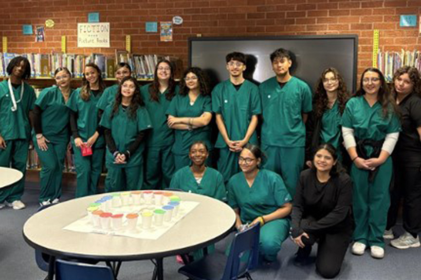 Group photo of Santa Rita dental students in their scrubs